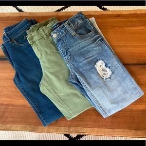 Three pairs girls jeans